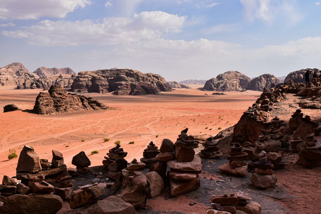 Explore the breathtaking rock formations of Wadi Rum, a UNESCO World Heritage site in Jordan's desert.