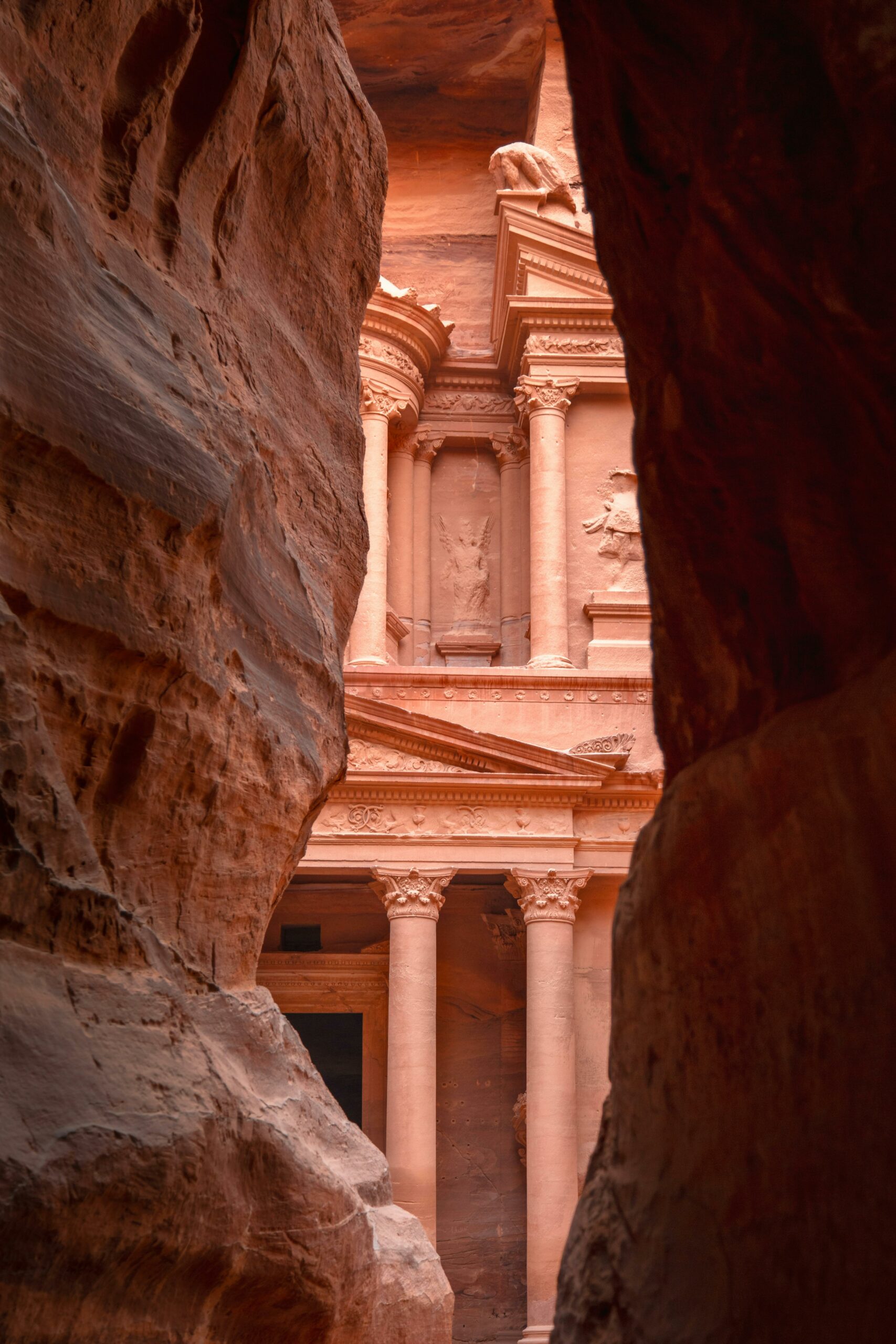 Capture of the famous Treasury of Petra, Jordan seen through the narrow Siq canyon passage.